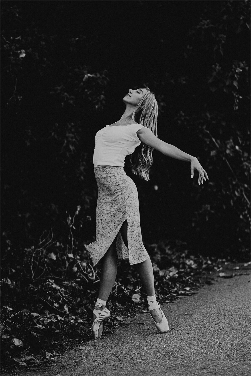 Elegant black and white ballet dancer senior portrait ballet point shoes Idaho senior photographer 