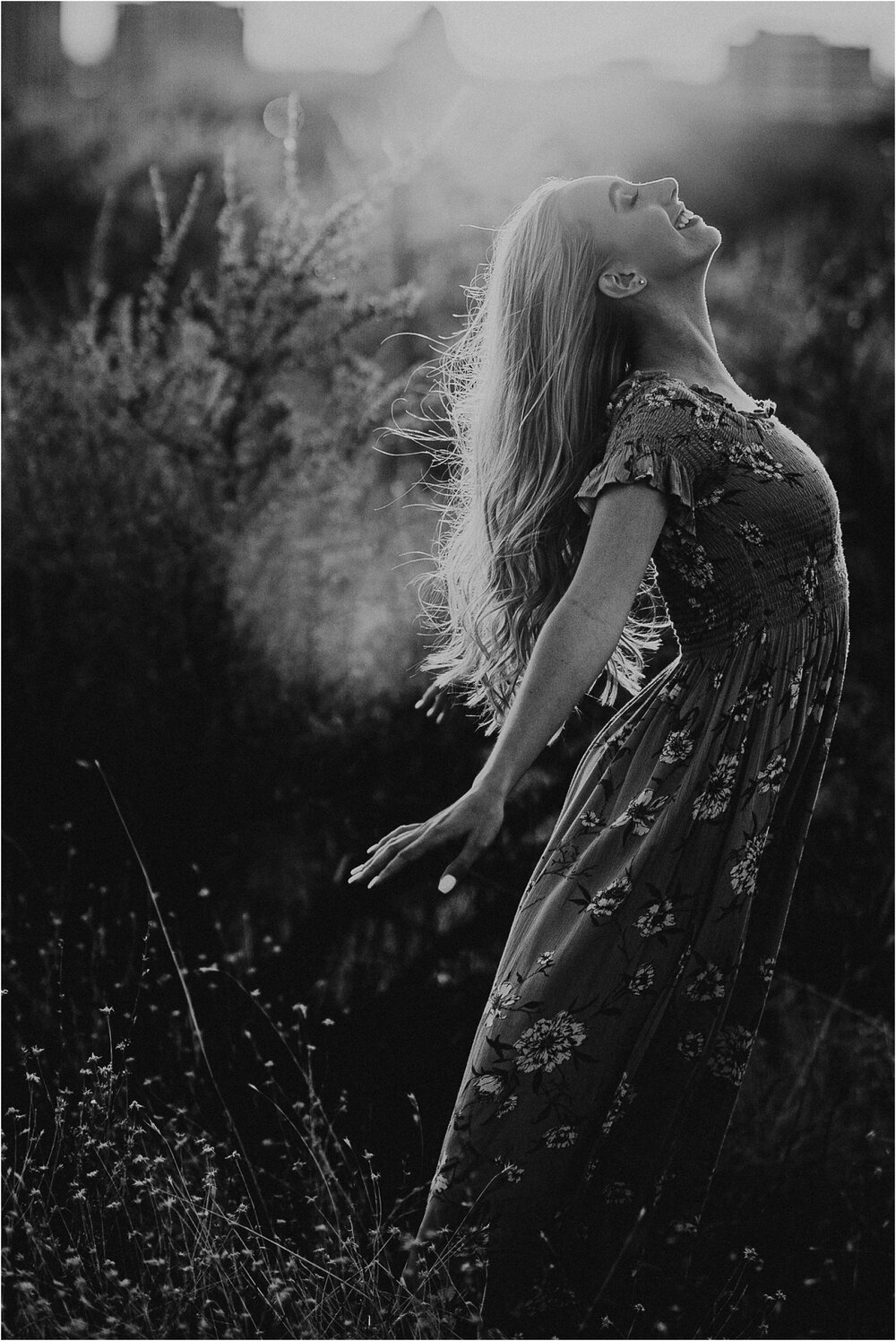 Black and white senior portraits free spirit downtown boise wind laughter candid unique senior photography