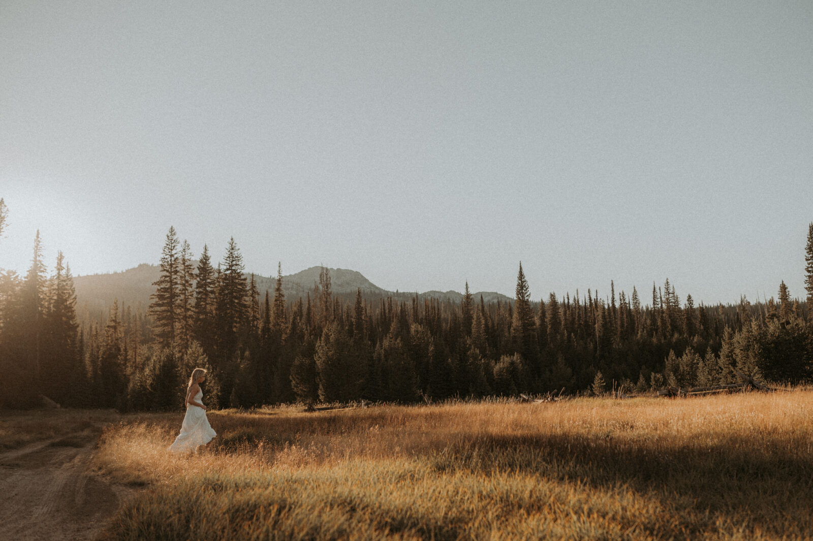 adventure summer senior pictures mountains mccall idaho beautiful boho white dress senior outfit ideas fun genuine real natural portraits makayla madden photography